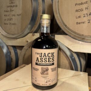 Coffee Rum in front of barrels