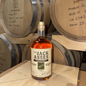 Spiced Rum in front of barrels